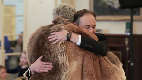 Greg Hunt embraces Ken Wyatt, sworn in this week as Minister for Indigenous Australians.