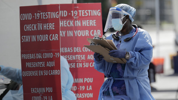 A healthcare worker at a COVID-19 testing site in South Florida.