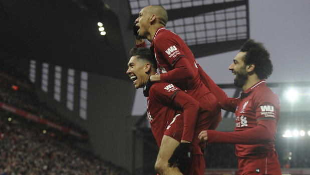 Soaring: Liverpool survived a thriller to stretch their lead over dormant Manchester City to seven points.