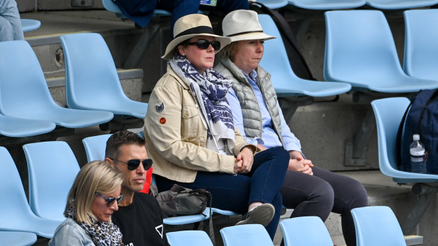 Kate Horwood (left) and Francesca Hart take in the action on Monday.