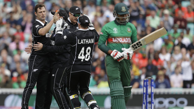 NZ celebrate taking the wicket of Soumya Sarkar.