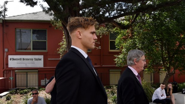 Jack de Belin arrives at the NSW District Court in Wollongong with his barrister David Campbell SC on Thursday morning.