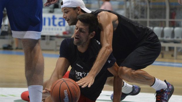 Grigor Dimitrov and Novak Djokovic warm up with a game of basketball ahead of the Adria Tour event in Croatia, three days before the former revealed he has tested positive for COVID-19