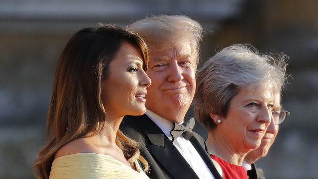 US President Donald Trump with his wife Melania and British Prime Minister Theresa May at Blenheim Palace.