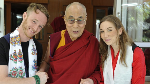 The Dalai Lama, centre, with his album collaborators Abe Kunin, left, and Junelle Kunin.