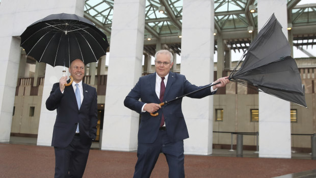 Treasurer Josh Frydenberg and Prime Minister Scott Morrison outside Parliament House.