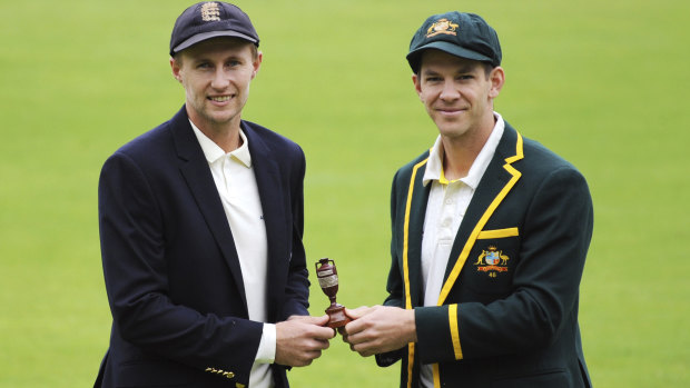 England captain Joe Root, left, and Australia's captain Tim Paine pose with the Ashes urn before the first Ashes Test match between England and Australia at Edgbaston.