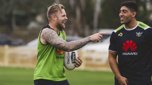 Raiders five-eighth Blake Austin sharing a laugh with Emre Guler.