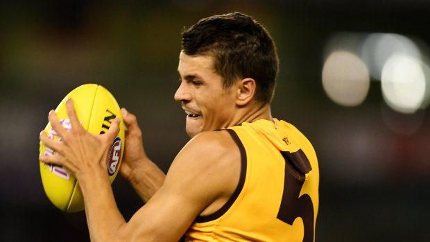 Hawthorn's Ryan Burton was shocked to find out he was on the trade table.