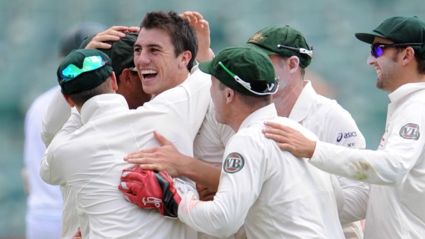 Pat Cummins and Australia celebrate a wicket in his debut against South Africa in 2011, a match that has striking similarities to what happened at Edgbaston.