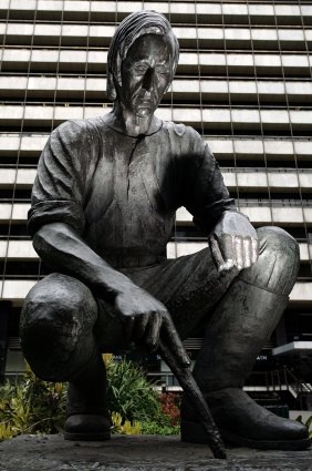 The Fawkner statue that once stood - or squatted - in Collins Street.