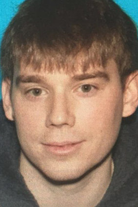 Travis Reinking, who police are searching for in connection with a fatal shooting at a Waffle House restaurant in Nashville .