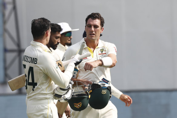 Pat Cummins batting with Peter Handscomb during the Delhi Test.