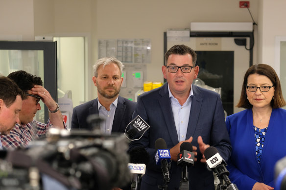 Brett Sutton with Premier Daniel Andrews and former health minister Jenny Mikakos in March.