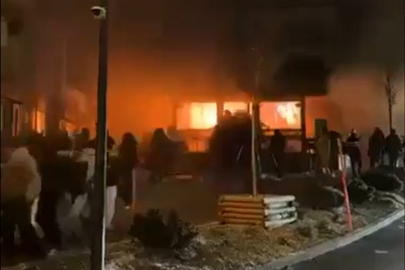 A screengrab from an unverified video on social media apparently taken from the road outside Le Constellation.