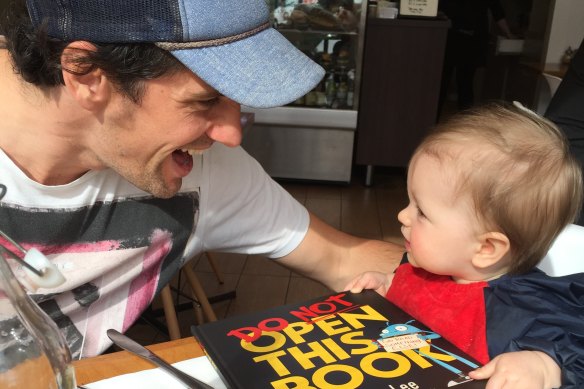 Andy Lee with his nephew George, for whom he wrote the book in 2016 as a first birthday present. George is now aged nine.