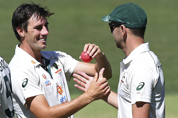 Josh Hazlewood, right, and Pat Cummins, left, had a day to remember. 