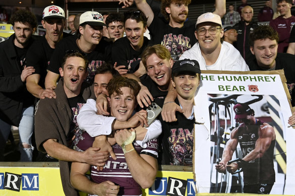 With friends like these: Manly rookie Jamie Humphreys is mobbed by his mates.