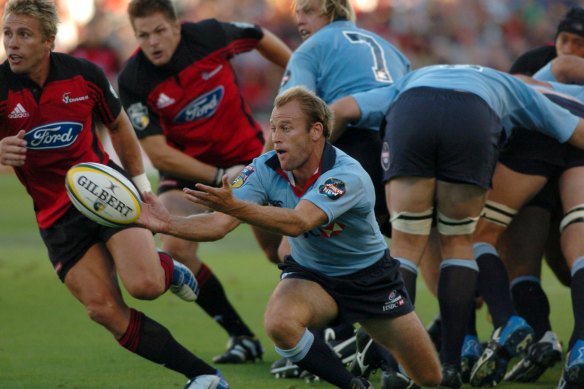 Super days: Chris Whitaker clears the ball from a Waratahs scrum against the Crusaders.