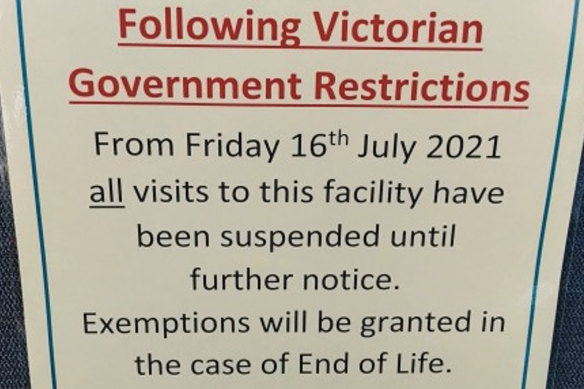 A sign in a Melbourne aged care home on Friday - in contravention of Victorian government orders allowing visits for “care and support”.