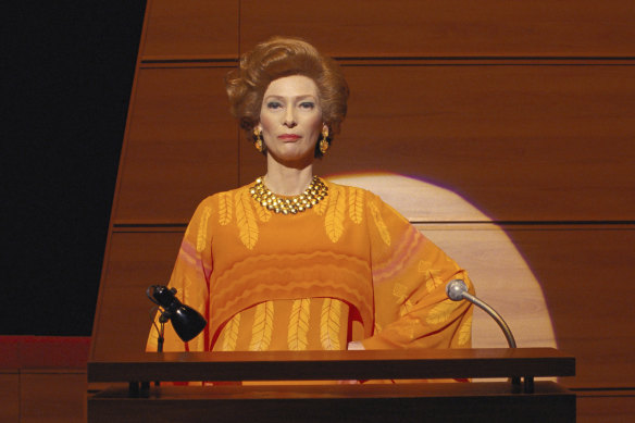 Tilda Swinton at the lecturn in The French Dispatch.