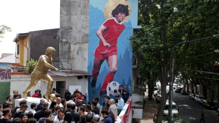 Immortalised: The statue of Diego Maradona during its presentation in Buenos Aires, Argentina near the stadium where he began his career.