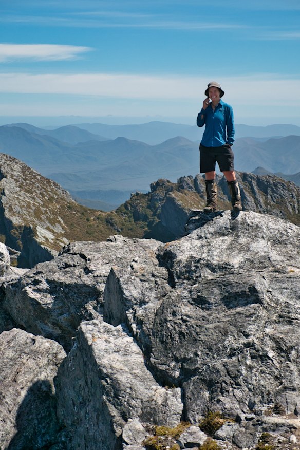 Becca Lunnon atop Federation Peak, which rates a maximum 10 in difficulty amongst Tasmanian climbs.