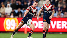 Daly Cherry-Evans kicks the ball.