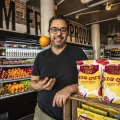 Co-founder Peter Varvaressos at Green’s Supermarket in Newtown.