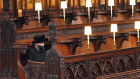 The Queen sits alone in St George’s Chapel, Windsor Castle, during her husband’s funeral ceremony.