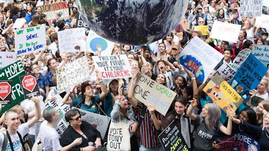 About 20,000 students skipped school on Friday to call for action on climate change at Sydney Town Hall.