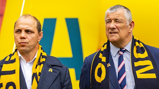 Rugby Australia’s Phil Waugh in 2022 alongside Rugby Victoria president Neil Hay and Reece Hodge, of the Melbourne Rebels.