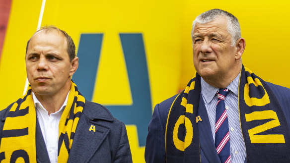 Rugby Australia’s Phil Waugh in 2022 alongside Rugby Victoria president Neil Hay and Reece Hodge, of the Melbourne Rebels.