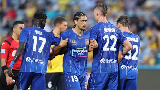 The Jets will continue to play in the A-League and W-League despite the cancellation of owner Martin Lee's licence.