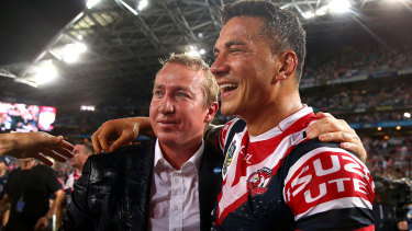 Sonny Bill Williams with Roosters coach Trent Robinson after the 2013 grand final.