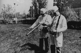 Soviet researchers measure radiation levels at the site on May 26, 1986.