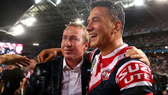 Sonny Bill Williams with Roosters coach Trent Robinson after the 2013 grand final.