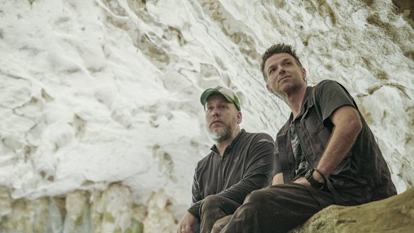 Griffith University's Professor Maxime Aubert (left) and Associate Professor Adam Brumm at the cave site.
