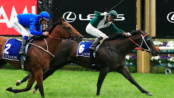 Exceedance draws away from Bivouac on the line in the Coolmore Stud Stakes.
