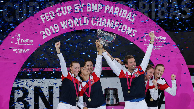 Glittering prize: Team France celebrate their first Fed Cup win since 2003.