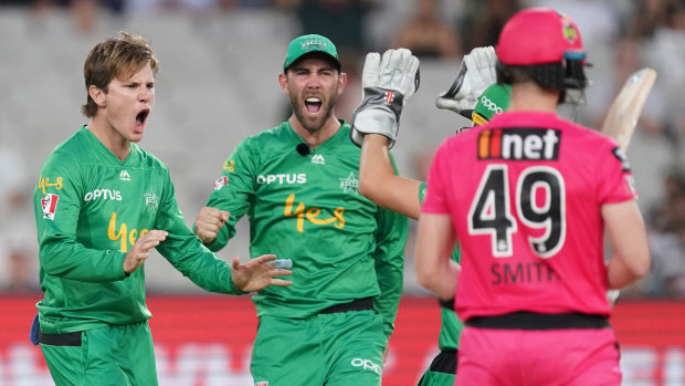 Adam Zampa (left) takes a wicket against the Sixers in the Stars' opening final.