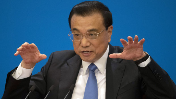 Chinese Premier Li Keqiang says the government does not order Chinese companies to spy on other countries.