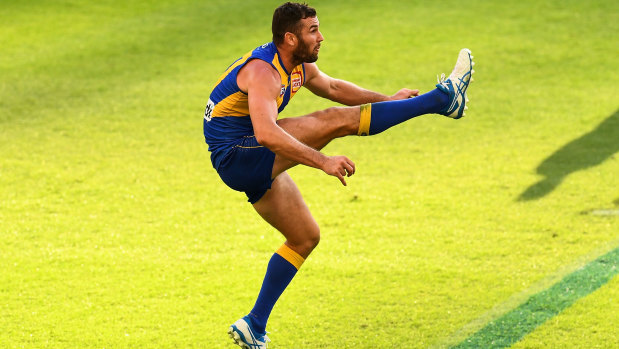 West Coast’s Jack Darling kicks a goal. 