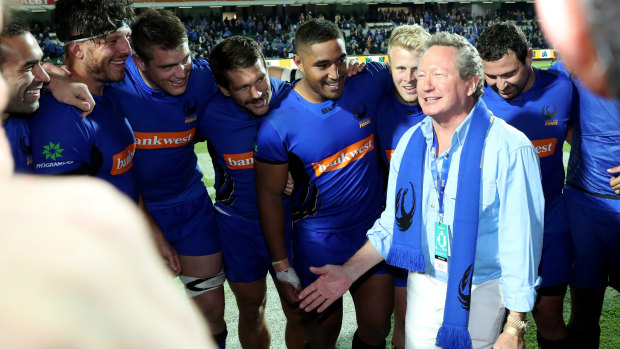 New force: Andrew Forrest addresses players after the opening World Series Rugby fixture.