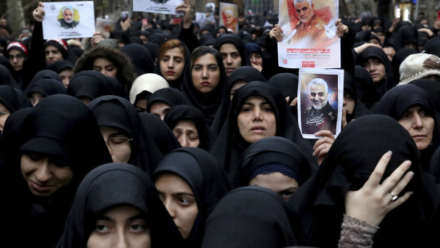 Protesters in Tehran on Saturday demonstrate over the US airstrike  that killed Qassem Soleimani.