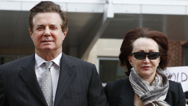 Paul Manafort and his wife Kathleen Manafort arrive at the Alexandria Federal Courthouse in March.