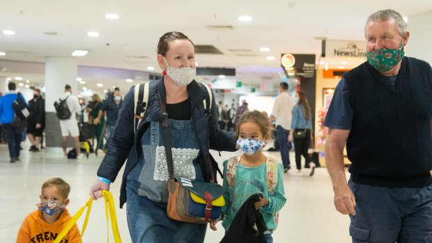 Brenda and Paul Heseltine, daughter Alison and grandchildren Ailani and Patrick at Melbourne Airport.