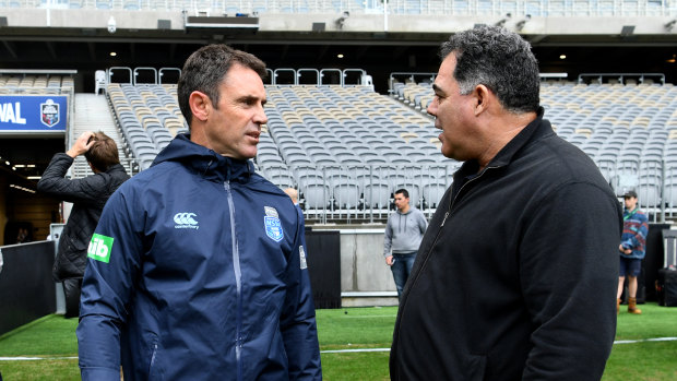 Brains trust: Brad Fittler chats with Kangaroos coach Mal Meninga before the NSW captain's run.