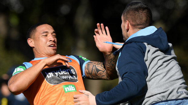 Almost clear: NSW back-rower Tyson Frizell (left).