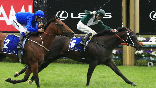 Exceedance draws away from Bivouac on the line in the Coolmore Stud Stakes.
